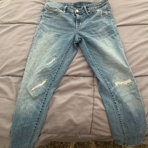 Mid-rise slightly distressed denim jeggings